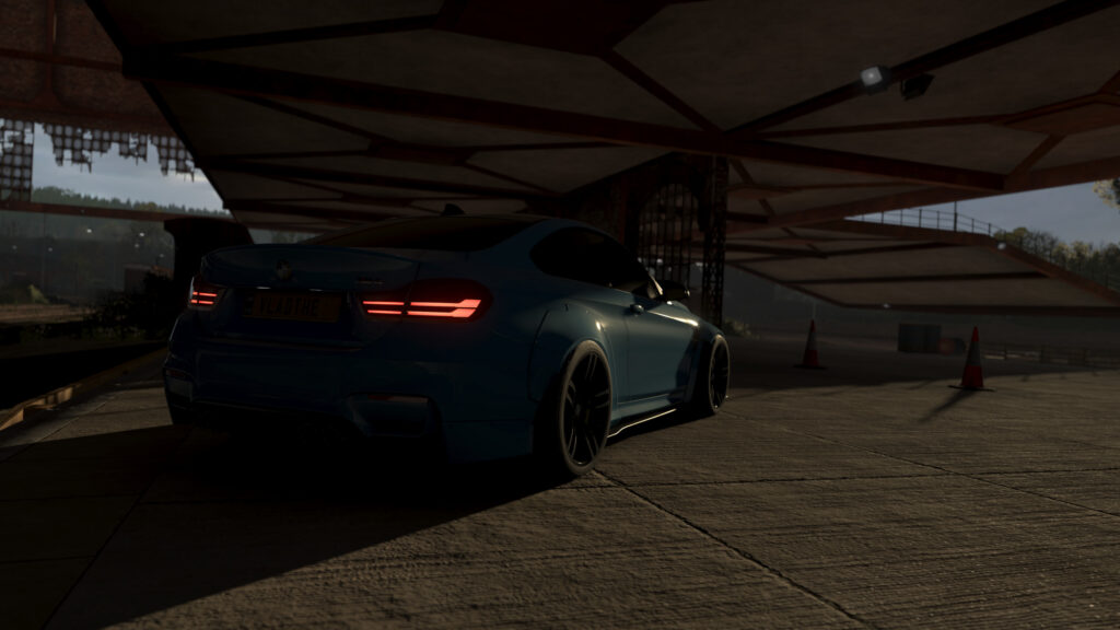 Stunning Modified BMW M4 Coupe Parked Under Industrial Structure PC Wallpaper