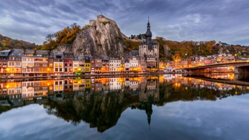 Breathtaking Dinant Cityscape with Collegiate Church and Fortress Desktop Wallpaper