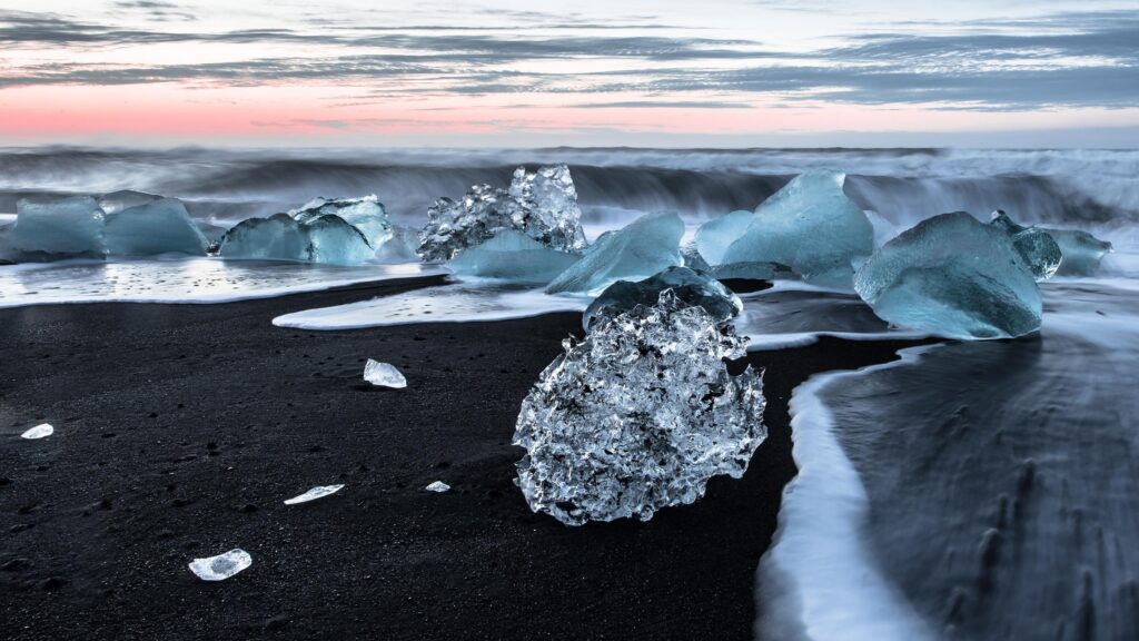 Stunning Icebergs on Black Sand Beach Iceland 4K Desktop Wallpaper