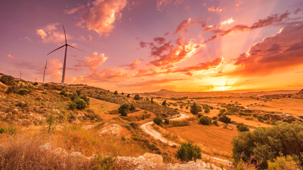 Golden Hour Landscape with Wind Turbines Scenic Sunset Desktop Wallpaper