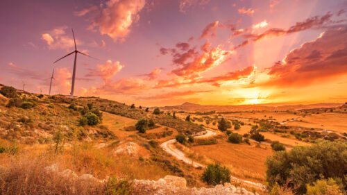 Golden Hour Landscape with Wind Turbines Scenic Sunset Desktop Wallpaper
