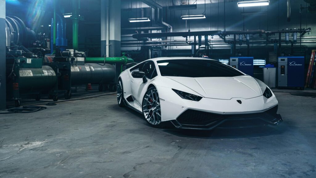 White Lamborghini Huracan Sports Car in Industrial Garage 4K Wallpaper