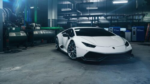 White Lamborghini Huracan Sports Car in Industrial Garage 4K Wallpaper