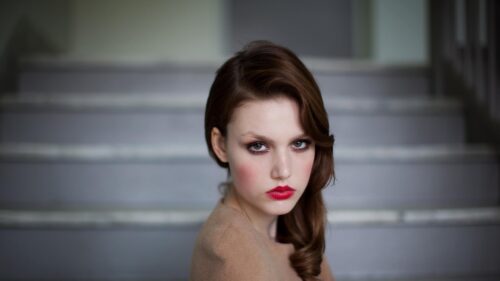 Elegant Young Woman with Bold Red Lips Portrait Desktop Wallpaper