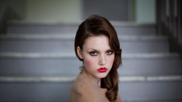 Elegant Young Woman with Bold Red Lips Portrait Desktop Wallpaper