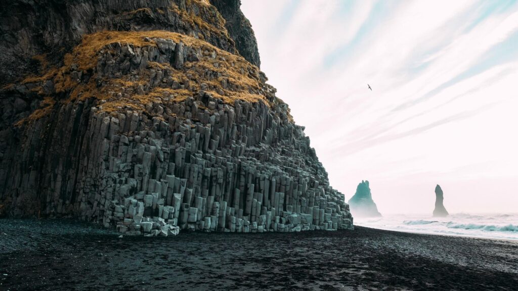 Dramatic Reynisfjara Basalt Columns and Black Sand Beach Desktop Wallpaper