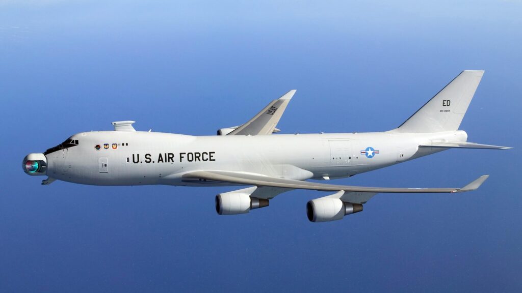 Boeing YAL-1 Airborne Laser Testbed Flying Over the Ocean Desktop Wallpaper