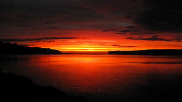 Fiery Sunset Over Calm Lake Landscape 4K Desktop Wallpaper