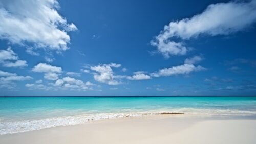 Stunning Tropical Beach with Turquoise Water and Clear Blue Sky PC Wallpaper