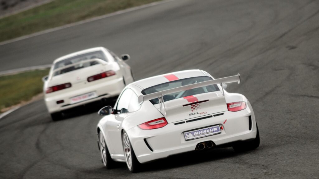 White Porsche 911 GT3 Racing on Track High Resolution 4K Wallpaper