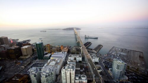 Stunning Aerial View of San Francisco Bay Bridge at Sunset Desktop Wallpaper