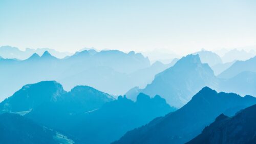 Serene Blue Mountain Peaks Atmospheric Landscape Desktop Wallpaper