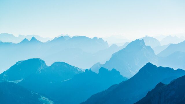 Serene Blue Mountain Peaks Atmospheric Landscape Desktop Wallpaper