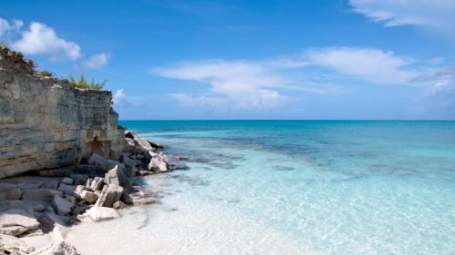 Stunning Caribbean Rocky Coastline with Crystal Clear Turquoise Water Desktop Wallpaper