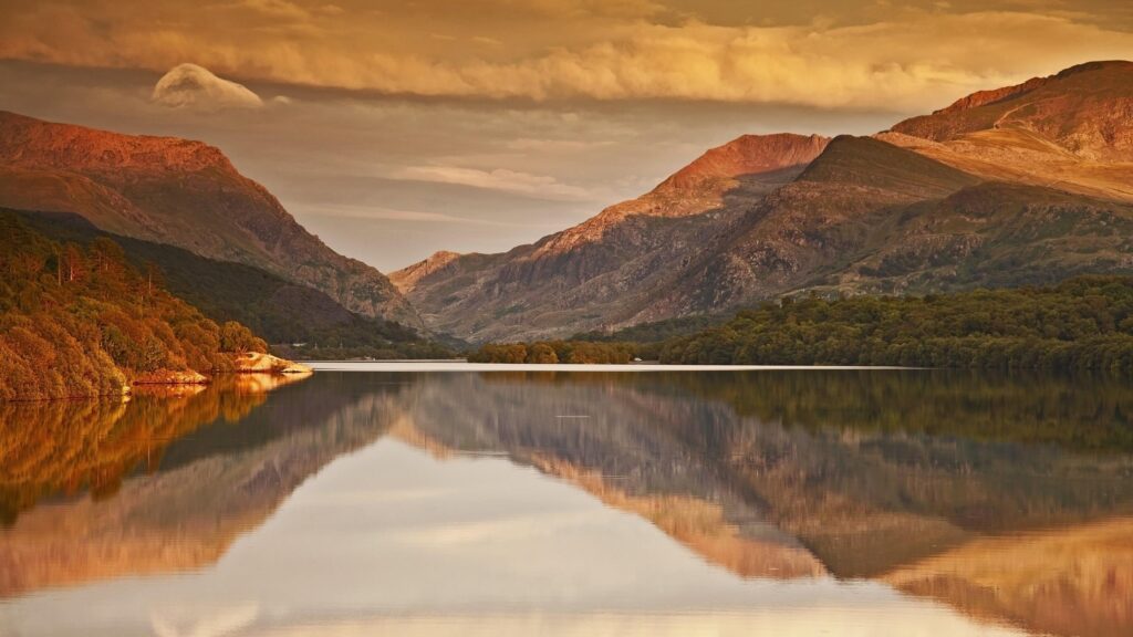 Serene Mountain Reflection Over Calm Lake Golden Sunset Desktop Wallpaper