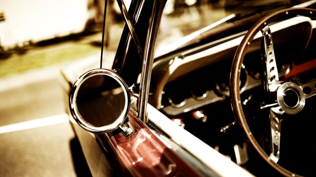 Vintage Classic Car Interior with Wooden Steering Wheel Desktop Wallpaper