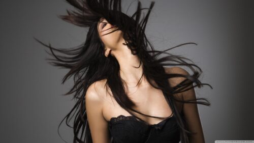 Stunning Brunette Model with Flowing Hair Portrait Desktop Wallpaper