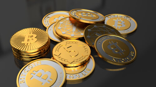 Golden Bitcoin Cryptocurrency Pile on Dark Reflective Surface 4K Desktop Wallpaper