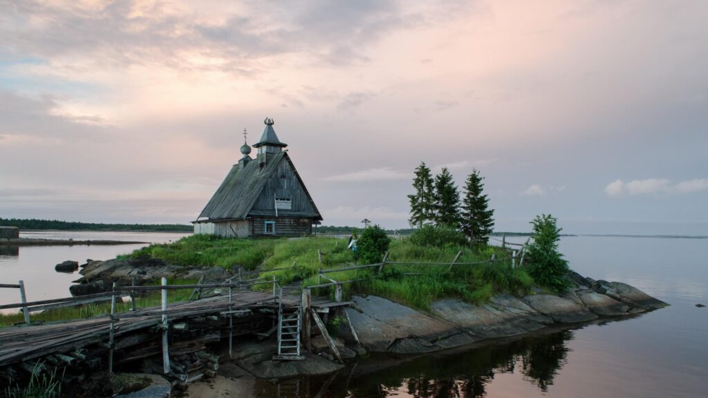 Rustic Wooden Church on Remote Island Serene Twilight Desktop Wallpaper