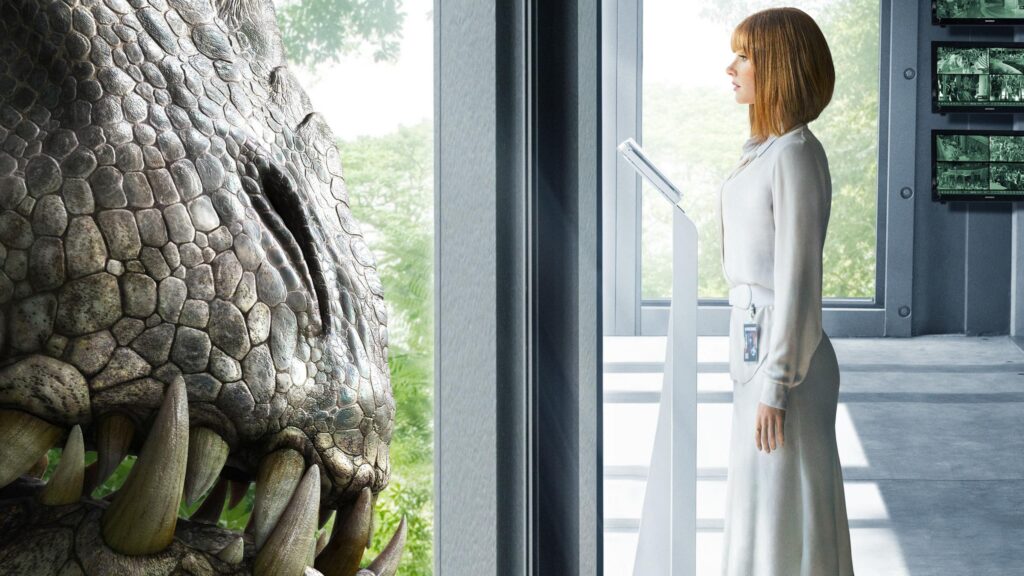 Bryce Dallas Howard Facing the Indominus Rex in Jurassic World Desktop Wallpaper