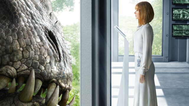 Bryce Dallas Howard Facing the Indominus Rex in Jurassic World Desktop Wallpaper