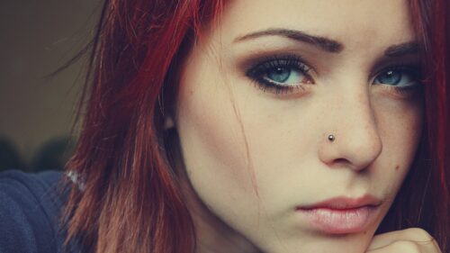 Stunning Portrait of a Woman with Red Hair and Blue Eyes PC Wallpaper