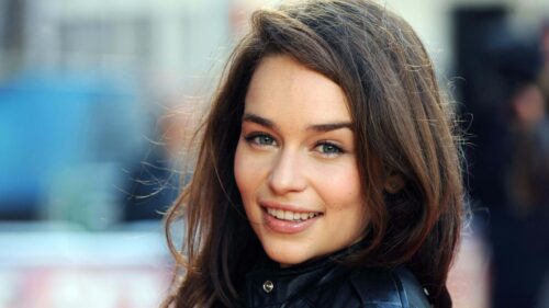 Stunning Portrait of Emilia Clarke with Radiant Smile 4K Desktop Wallpaper