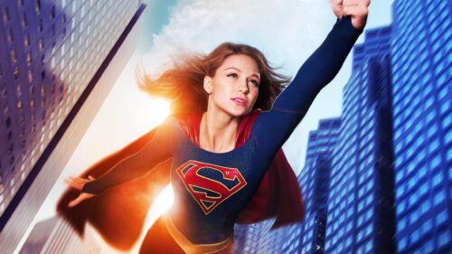 Melissa Benoist as Supergirl Flying Through Cityscape 4K Desktop Wallpaper