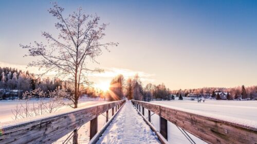 Stunning Snowy Bridge Walkway at Golden Hour Winter Sunset Desktop Wallpaper