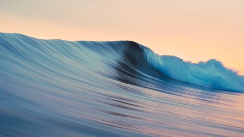 Abstract Motion Blur Ocean Wave at Sunset Minimalist 4K Desktop Wallpaper