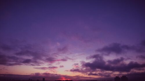 Stunning Purple and Pink Sunset Sky over City Silhouette Desktop Wallpaper