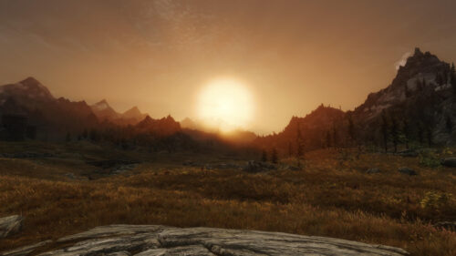 Breathtaking Skyrim Landscape Sunset over Mountain Peaks PC Wallpaper