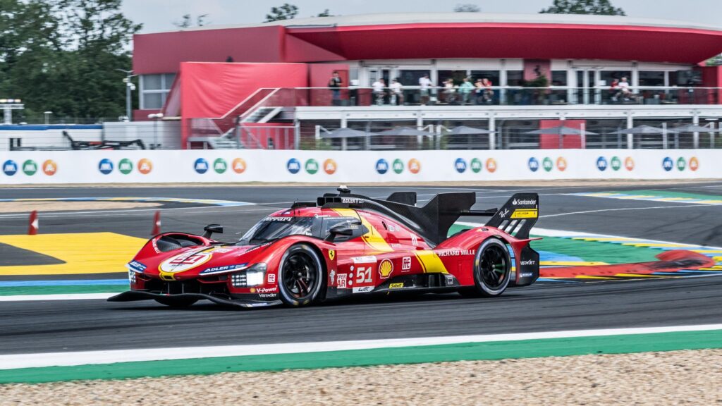 Ferrari 499P Le Mans Hypercar Racing on Track Desktop Wallpaper