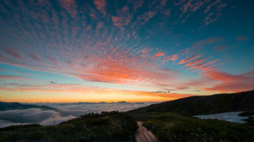Breathtaking Mountain Peak Sunrise Over Sea of Clouds Desktop Wallpaper