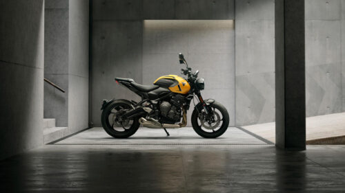 Stunning Yellow Triumph Trident 660 Motorcycle in Concrete Studio 4K Wallpaper