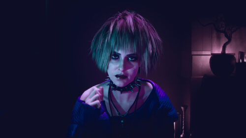 Edgy Punk Girl with Neon Purple Lighting Cinematic 4K Desktop Wallpaper