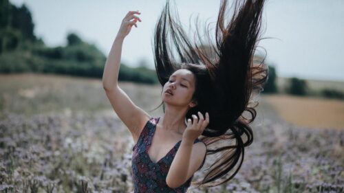 Woman With Flowing Hair in Lavender Field 4K Desktop Wallpaper