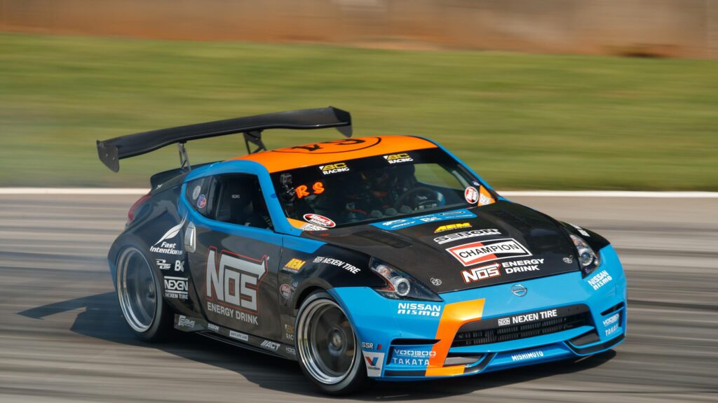 NOS Energy Drink Nissan 370Z Drift Car Racing on Track 4K Wallpaper