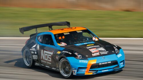 NOS Energy Drink Nissan 370Z Drift Car Racing on Track 4K Wallpaper
