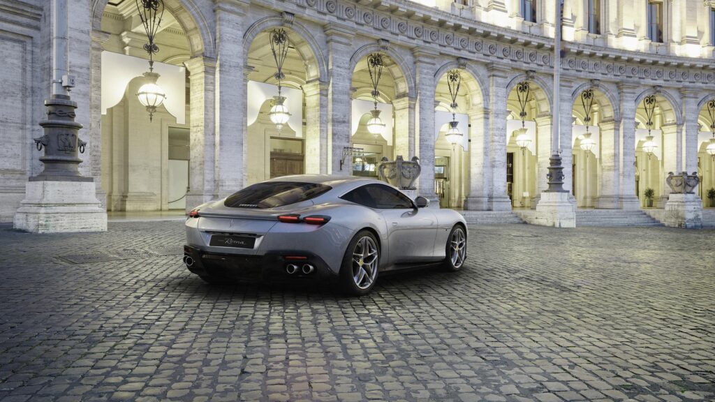 Stunning Silver Ferrari Roma Parked on Historic Cobblestone Street 4K Desktop Wallpaper