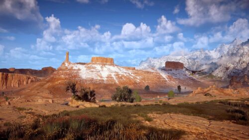 Horizon Forbidden West Desert Canyons and Snowy Mountain Peaks Desktop Wallpaper
