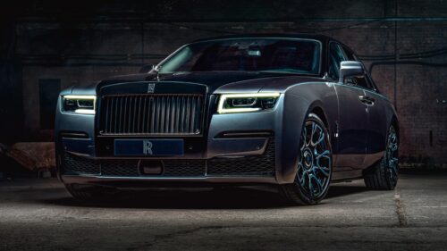 Stunning Rolls Royce Ghost Black Badge in Industrial Setting Desktop Wallpaper