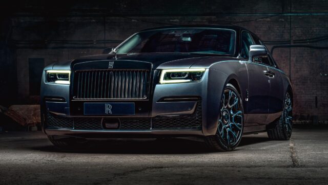 Stunning Rolls Royce Ghost Black Badge in Industrial Setting Desktop Wallpaper