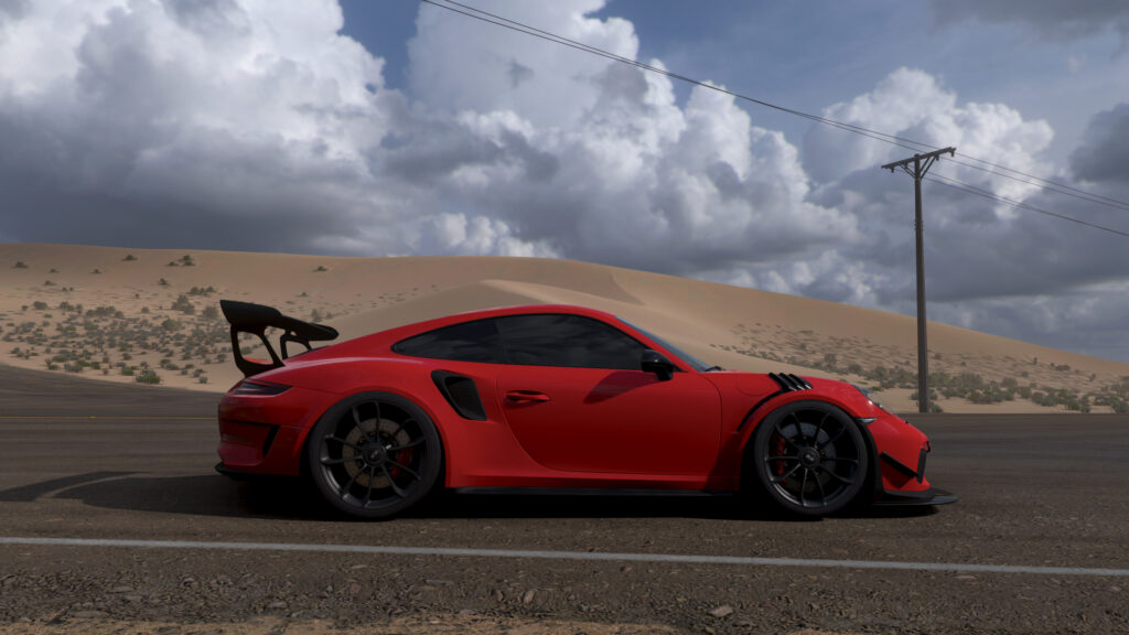 Red Porsche 911 GT3 RS on Desert Road 4K Desktop Wallpaper