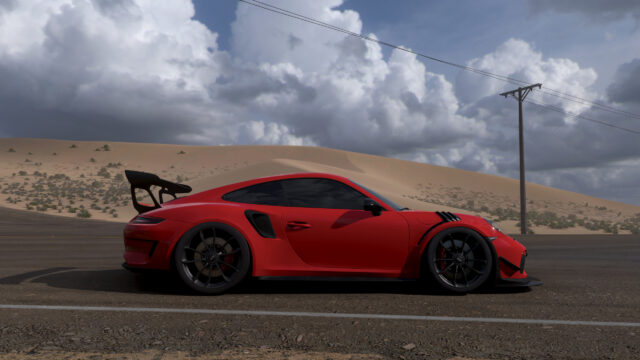 Red Porsche 911 GT3 RS on Desert Road 4K Desktop Wallpaper