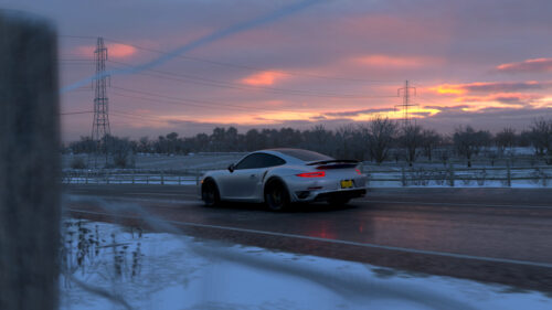 Stunning Porsche 911 Turbo S Driving on Snowy Road at Sunset 4K Wallpaper