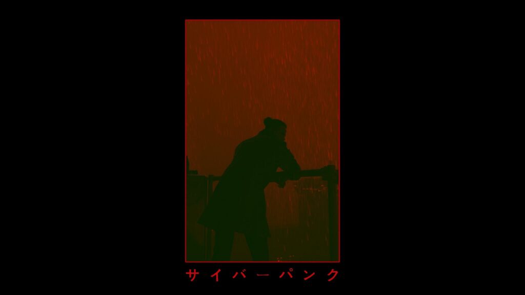 Minimalist Cyberpunk Aesthetic Man in Red Rainy Night Desktop Wallpaper