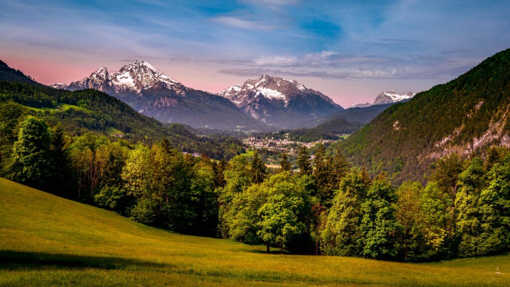 Stunning Alpine Valley Landscape with Snow-Capped Mountains at Sunset 4K Wallpaper