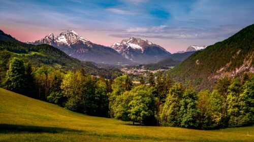Stunning Alpine Valley Landscape with Snow-Capped Mountains at Sunset 4K Wallpaper