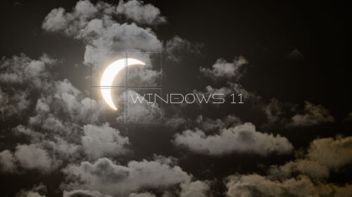 Windows 11 Logo with Solar Eclipse in Moody Clouds 4K Wallpaper